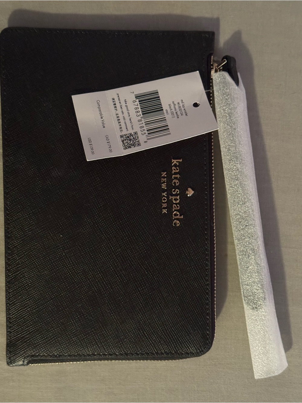 kate spade black wristlet with gold logo